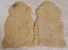 A pair of retro  1970`s sheepskin rugs  ( 2 ) stamped to the back Made in Australia, Export