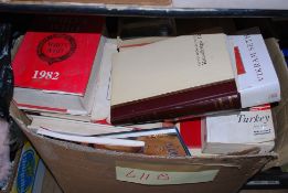 A large box of books to include Who's Who, travel guides, reference books etc