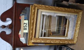 A collection of 6 picture frames and a large mirror
