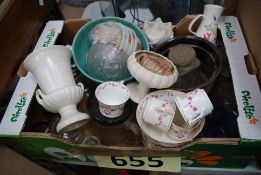 A large quantity of china to include Wade, Poole Pottery, apothecary jars and other items.