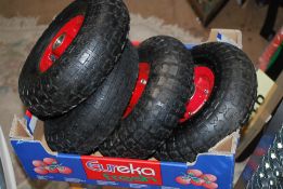 A set of 4 new 4" x 10X sacktruck / barrow / cart wheels and tyres.