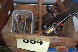 A collection of vintage tools to include saws, punch sets etc