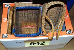 A box of baskets to include a blue handled ship glass tray.