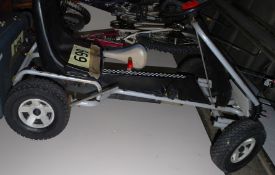 A childs Go-Kart pedal car with chain drive and rubber tyres