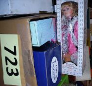 A collection of porcelain dolls, still in boxes including Leonardo and other similar makes.