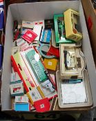 A collection of vintage matches and matchbooks along with a few diecast toy cars.