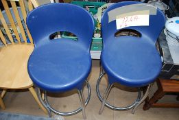 2 pairs of bar stools, one being chrome the other pair blue molded plastic.
