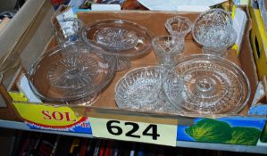 A collection of glassware to include cake plates, vases etc.