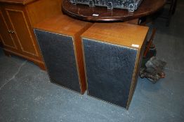 A large pair of retro 1970`s teak speakers for Hi-fi by Goodmans. both having labels to the fabric
