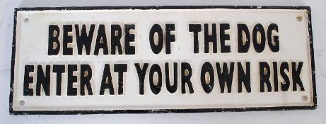 A large vintage style cast metal ` Beware Of The Dog ` sign.