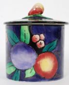 A 20th century hand painted Rubens Ware style conserve pot, with hand painted decoration and pear