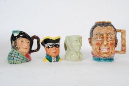 A collection of Toby jugs to include Auld Mac, Dick Turpin and others