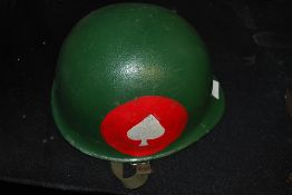 A 20th century  American Military Helmet of Type I Ground Troops complete with inner lining bearing