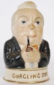 A Harold Wilson gurgling jug by Kensington Price