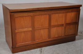 A Nathan retro 1970`s teak wood low entertainment tv cabinet sideboard. The 2 drawers with fall