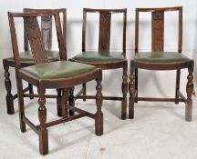 A set of 4 1930`s Art Deco rail back dining chairs having railed tall b back rests and drop in