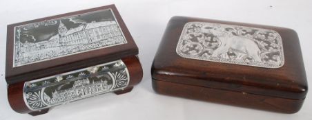 A 20th century Asian oak jewellery box with affixed white metal elephant plaque to top, along with