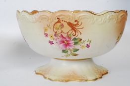 A large Victorian Carltonware W & R ivory blush fruit bowl having decorative design being marked to