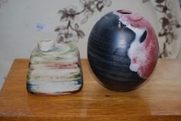 Two pieces of studio pottery in the form of ink wells having nieve abstract decoration. One marked