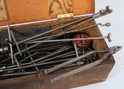 A collection of handmade mid 20th century steel tools and equipment complete in wooden workbox. To