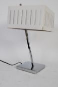 A 1980`s chrome table lamp with original shade.