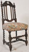 A Victorian Jacobean style carved oak dining / hall chair