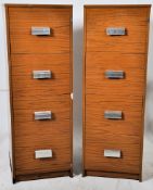 A pair of 1970`s oak veneer retro office filing cabinets, each with 4 drawers complete with