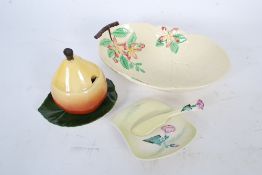 A Carlton Ware pear conserve pot with leaf plate together with a Carltonware butter dish and knife
