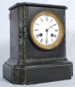 A marble / slate mantel clock eight day movement.