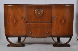 1930's Art Deco walnut sideboard dresser. The sideboard raised on decorative legs having end