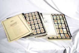 A set of reproduction presentation cigarette cards.