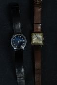 2 vintage Timex gentlemans wristwatches. One being blue faced having date dial and leather strap,