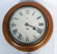 A 1940's oak cased station wall clock bearing unusualh lozenge mark D to the centre dial. Brass