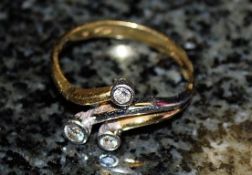 An unusual 3 stone diamond ring 18k. Size V