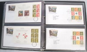 Stamps: An album of first day covers.