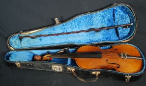 A 20th century cased violin and violin bow.