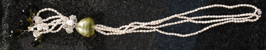 Two rows pearl necklace with large heart shaped pendant