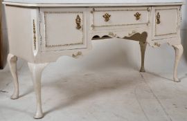 A painted 1930's French style shabby chic  dressing table / writing desk. Raised on cabriole legs