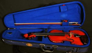 A contemporary cased students violin.