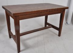 A solid pine heavy refectory dining table in the 18th century style  stood on squared chamfered edge