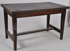 A solid pine heavy refectory dining table in the 18th century style  stood on squared chamfered edge