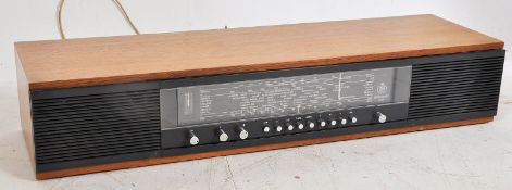 An original teak Bang & Olufsen radio.