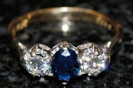A diamond and sapphire ring 18k approx 50pts. Size X