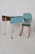A Formica topped drop leaf table and 3 chairs, all on metal supports