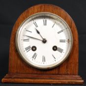 An early 20th century German Lenzkurch mahogany dome top 8 day mantel clock. The mahogany case