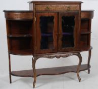 An Edwardian mahogany demi lune  chiffonier sideboard raised on shaped legs with central cabinet