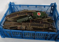 A collection of vintage Hornby Dublo 3 track gauge railway track to include straights, junctions etc