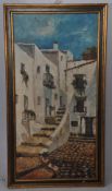 A large framed 20th century oil on board painting of a continental street scene. Signed to lower