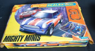 A Micro Scalextric MIghty Minis set complete with cars in the original box