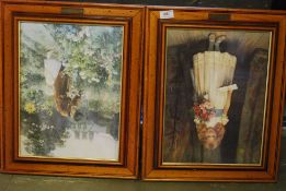 A pair of framed and glazed prints.